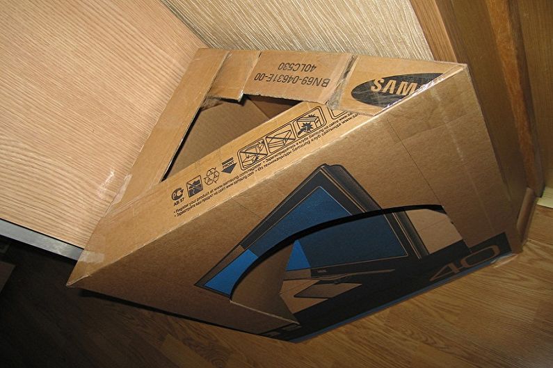 Making a fake fireplace frame with your own hands - From a large packaging box