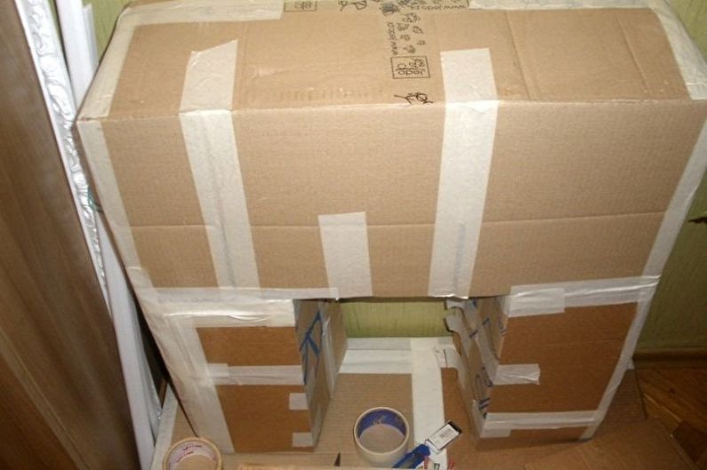 Making a fake fireplace frame with your own hands - From cardboard boxes