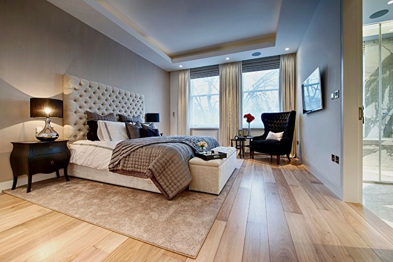 Two-level plasterboard ceiling in the bedroom
