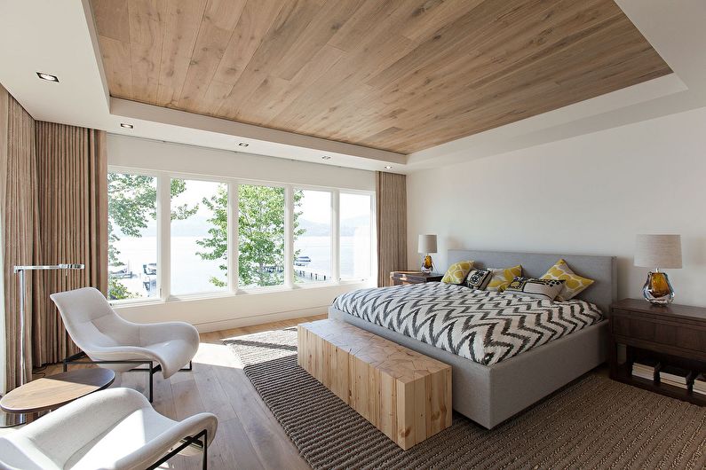 Combined ceiling in the bedroom