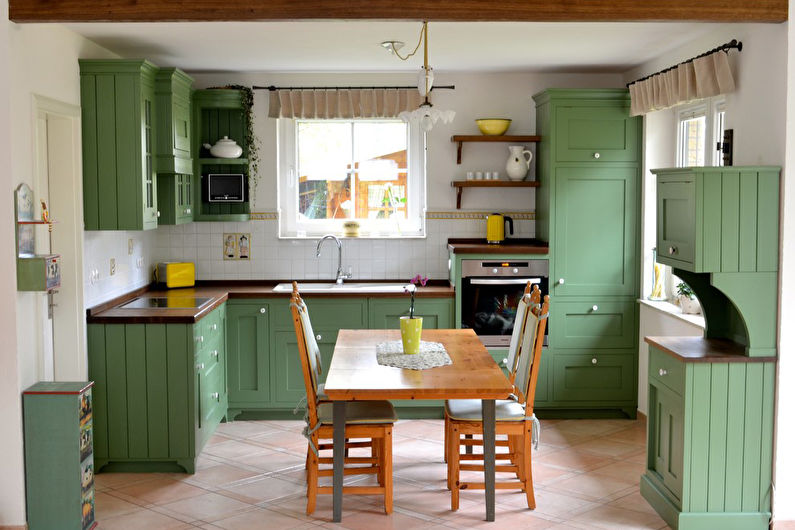 Colore pistacchio all'interno della cucina - Foto di design