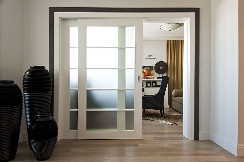 White doors in the interior - Opening mechanism