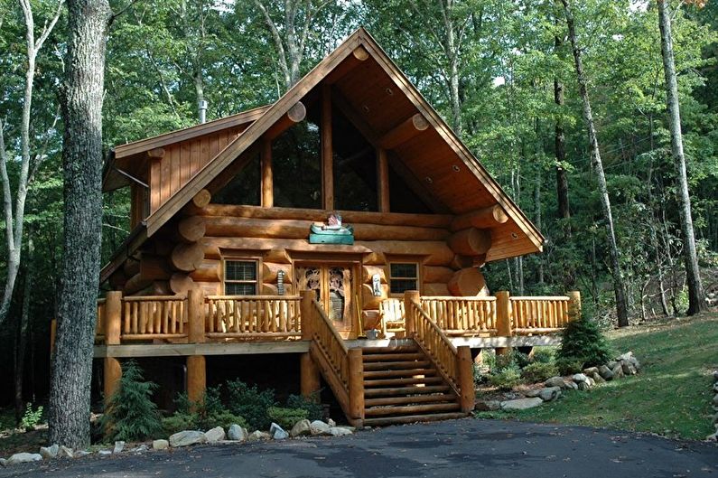 Modern house designs from a log house - The hunting lodge from the rounded log