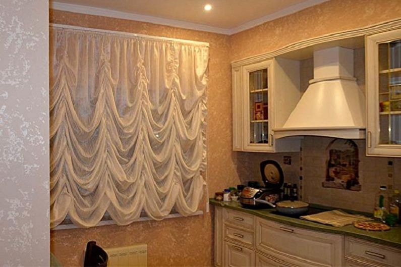 French curtains in the interior of the kitchen