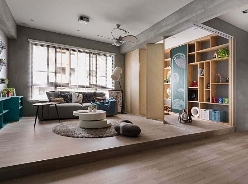 Zoning the living room and children's room with a folding screen