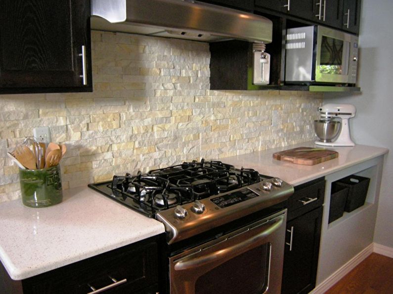 Decorative stone in the interior of the kitchen - photo