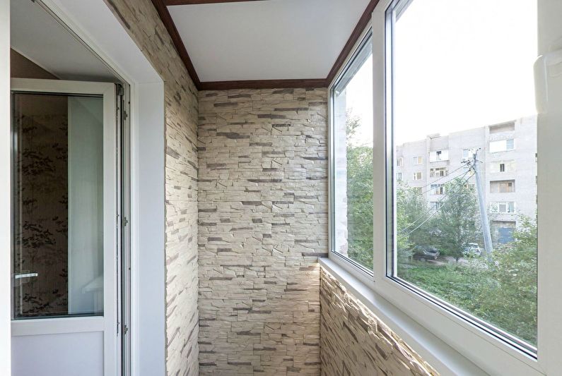 Decorative stone in the interior of the balcony and loggia - photo