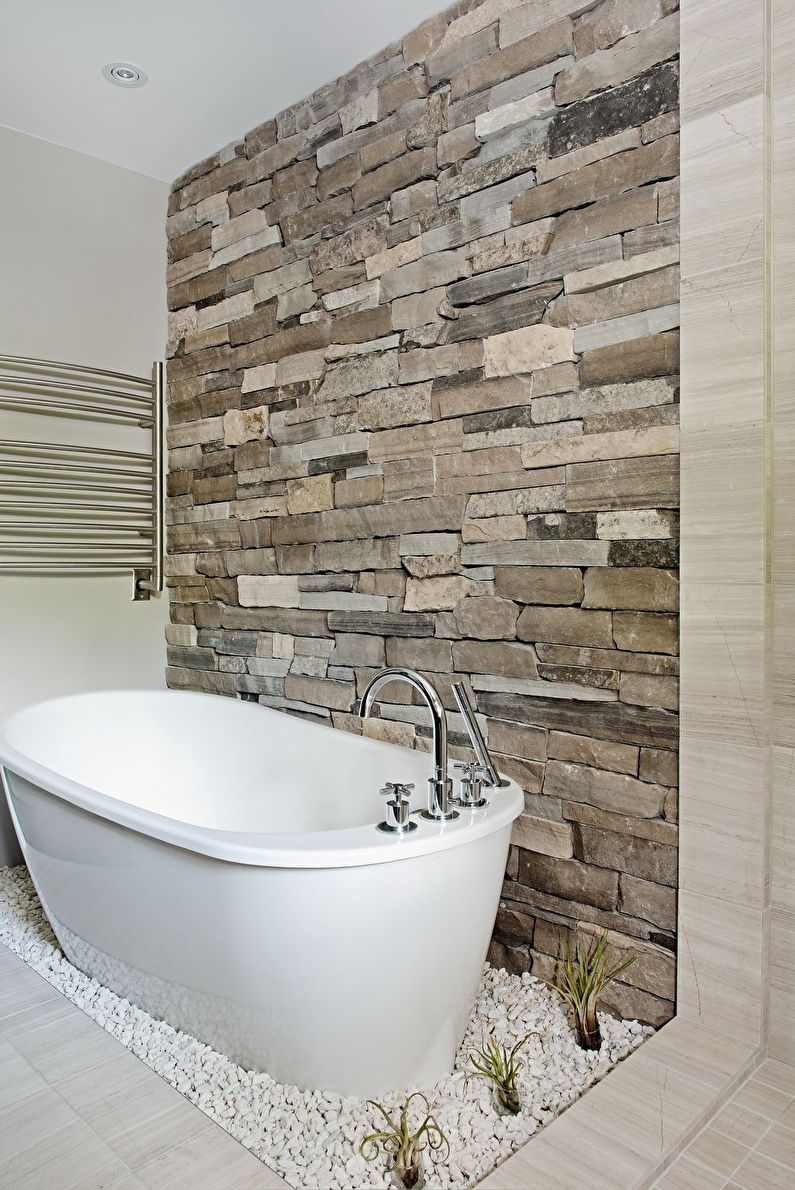 Decorative stone in the interior of the bathroom - photo