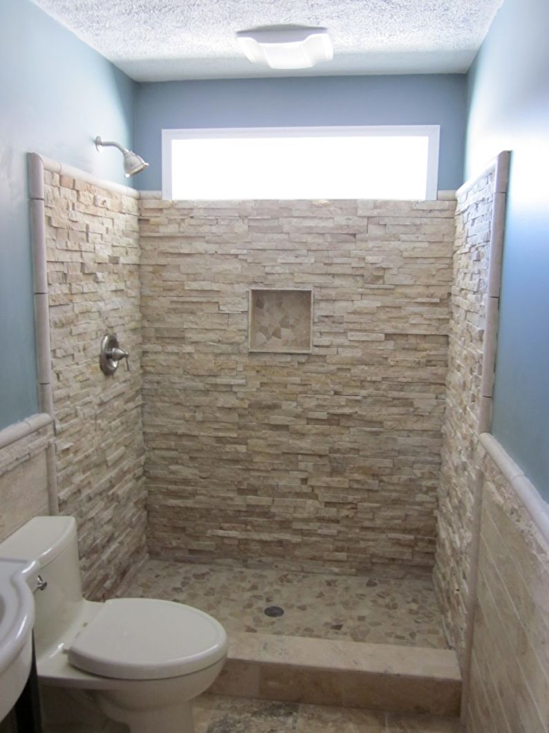 Decorative stone in the interior of the bathroom - photo