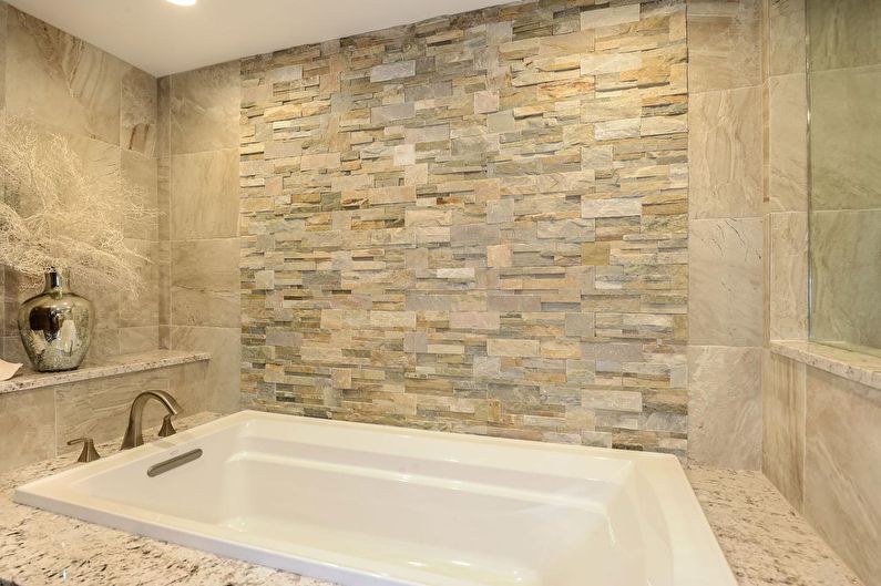 Decorative stone in the interior of the bathroom - photo