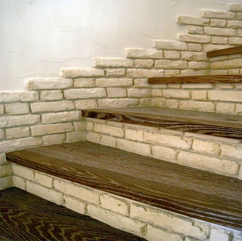 Decoration of stairs with decorative stone - photo
