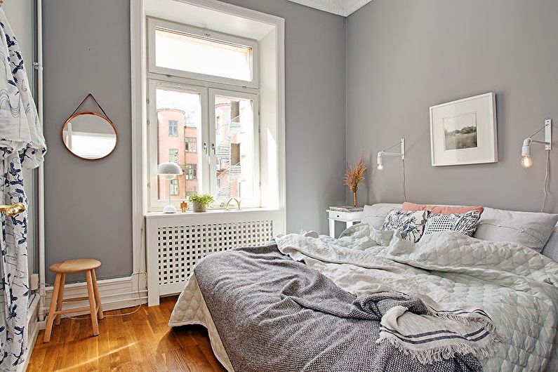 Design of a small bedroom in gray tones - photo