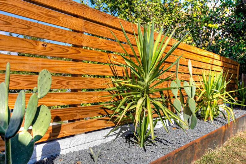 Wooden fences for a private house - photo