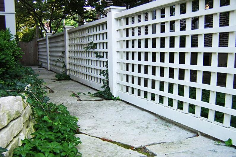 Wooden fences for a private house - photo