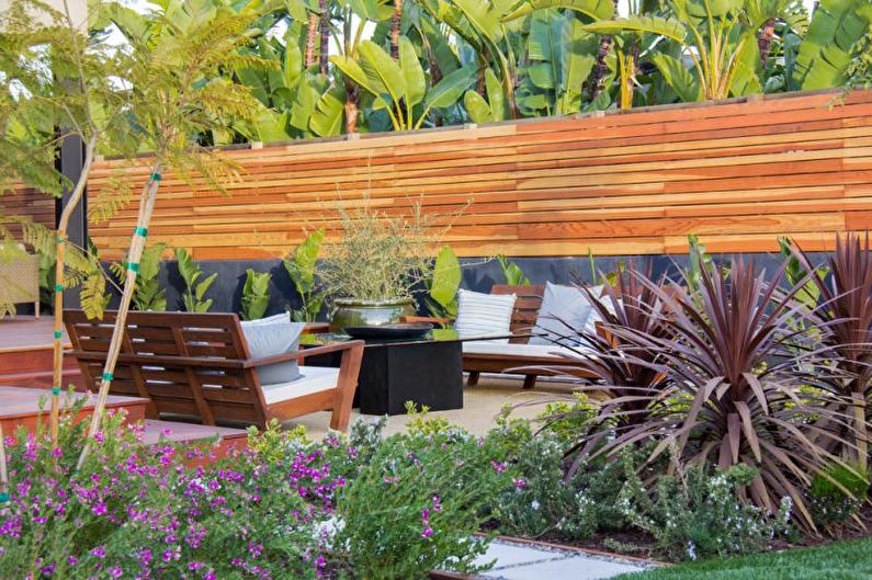 Wooden fences for a private house - photo