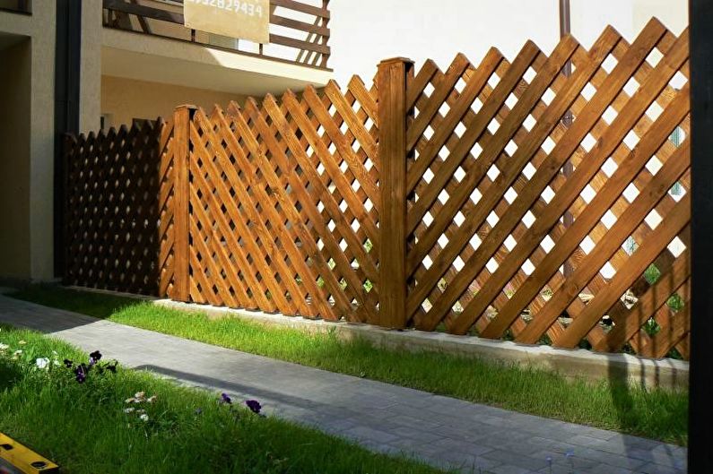 Wooden fences for a private house - photo