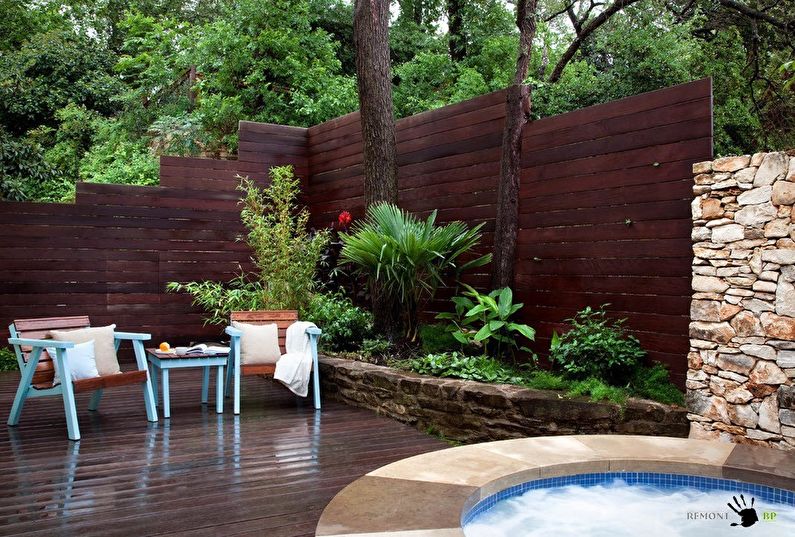 Wooden fences for a private house - photo