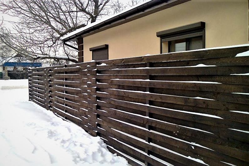 Wooden fences for a private house - photo