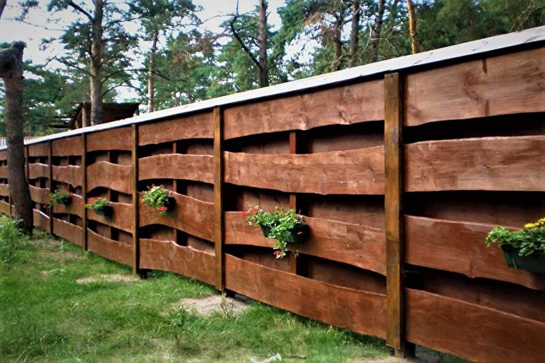 Wooden fences for a private house - photo