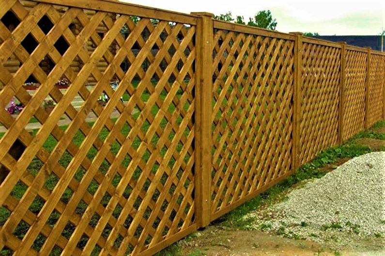 Wooden fences for a private house - photo