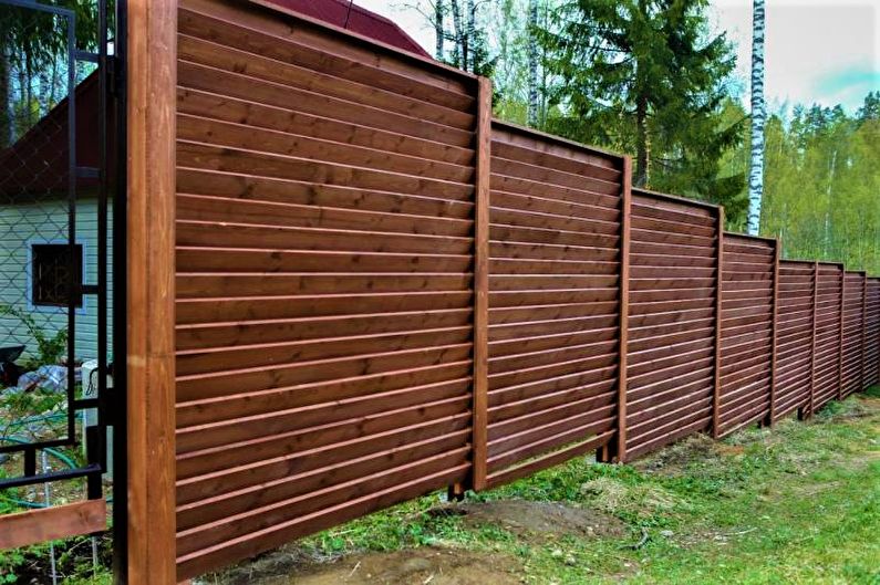 Wooden fences for a private house - photo
