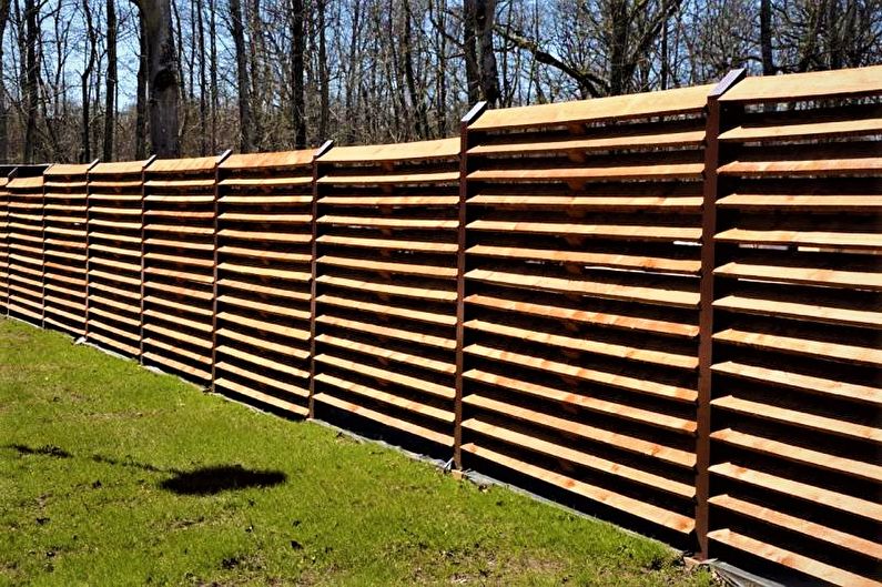 Wooden fences for a private house - photo