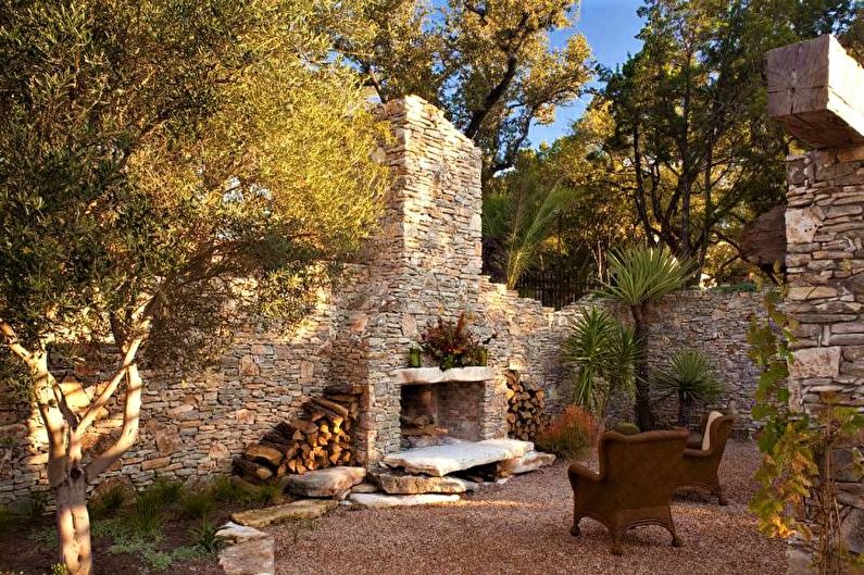 Stone fence for a private house - photo