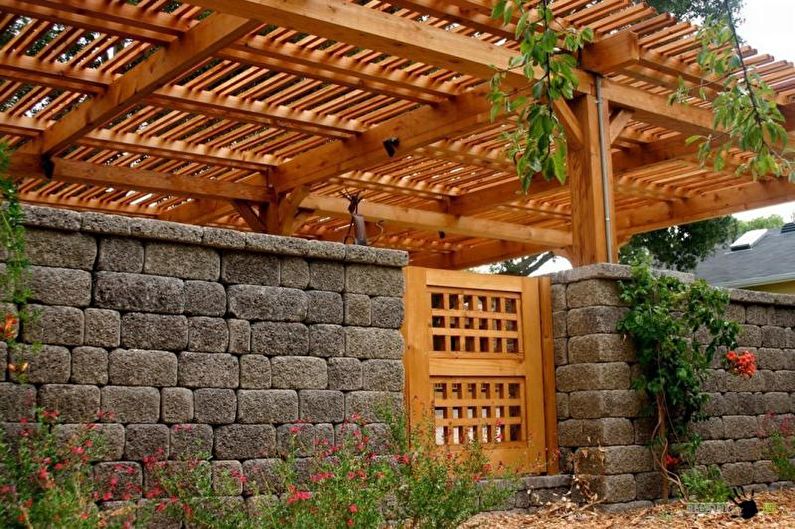 Stone fence for a private house - photo