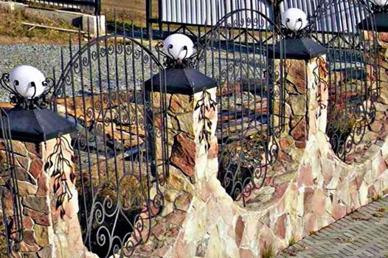 Stone fence for a private house - photo