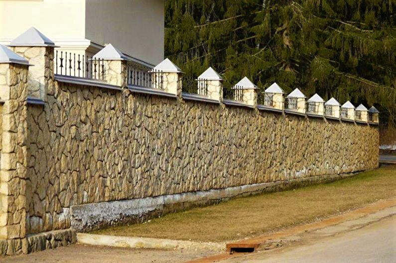 Stone fence for a private house - photo