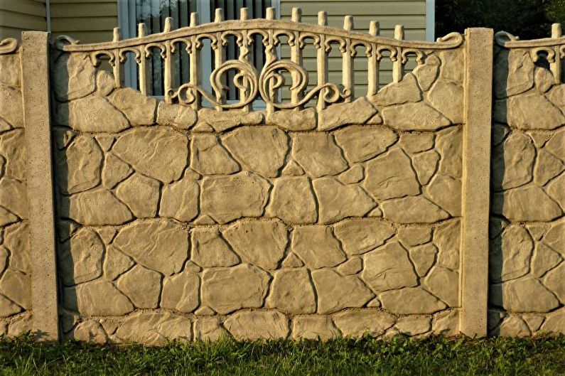 Reinforced concrete fence for a private house - photo