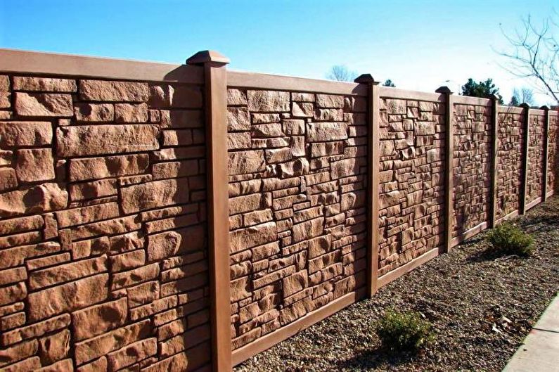 Reinforced concrete fence for a private house - photo
