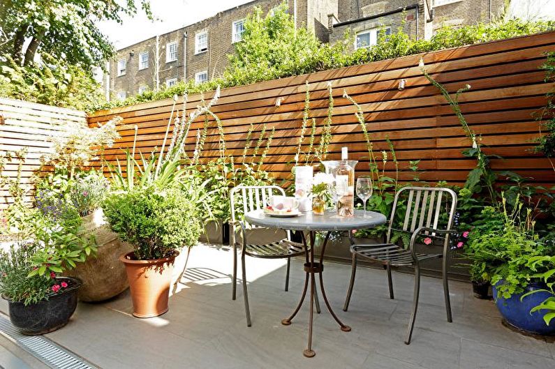 Decor for a fence for a private house - photo