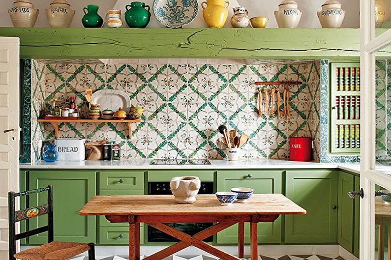 Interior design of a white-green kitchen - photo