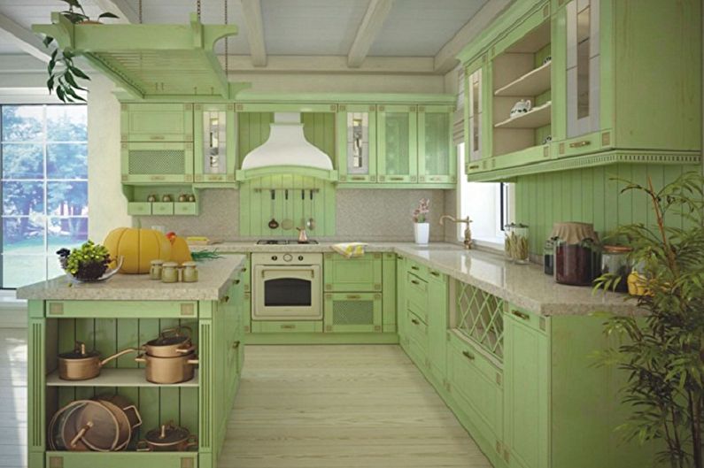 Interior design of a white-green kitchen - photo