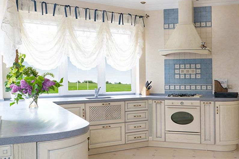 Kitchen interior design in provence style - photo
